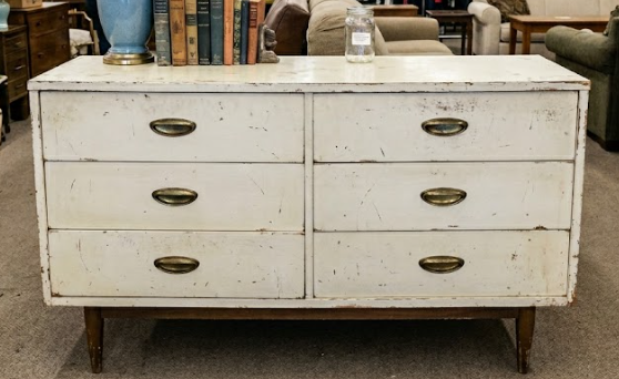 Mid-century dresser with distressed white finish